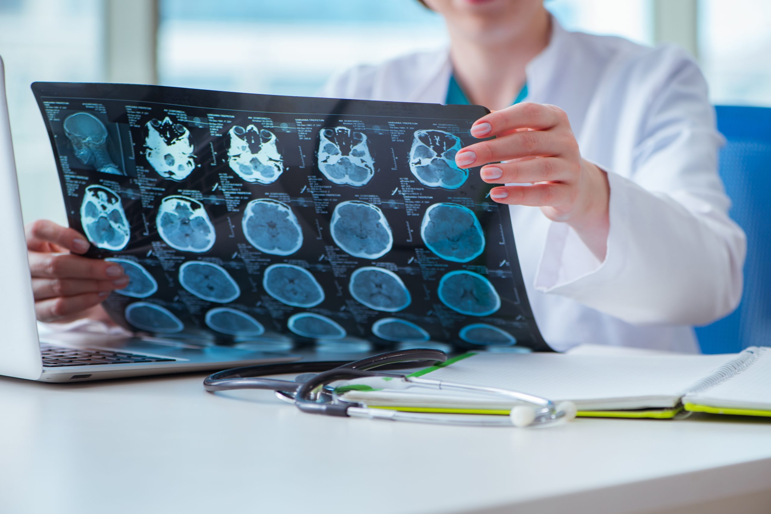 Doctor examining MRI image in hospital